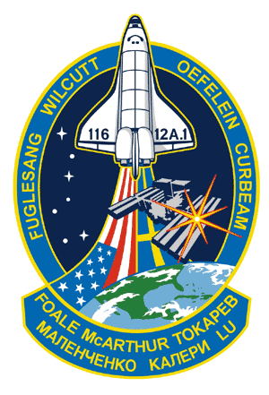 TTS-116/ISS 12A.1s emblem.